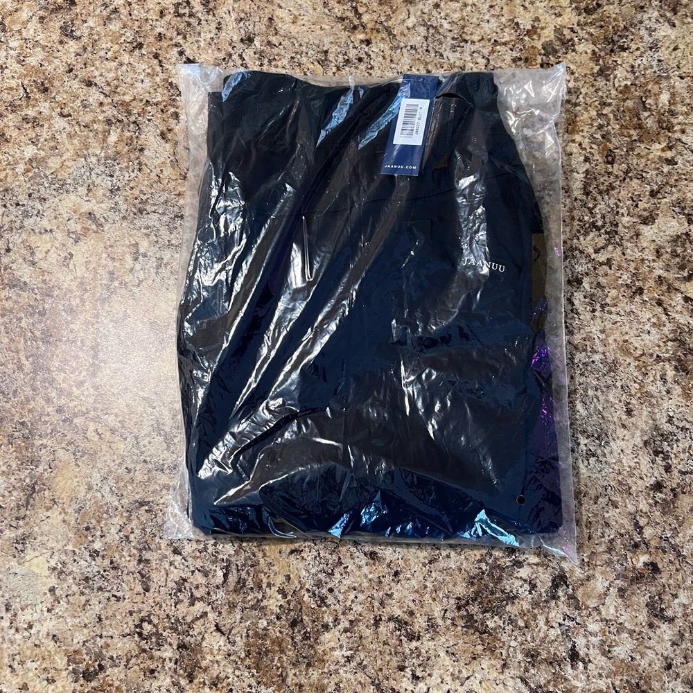 Men’s Jaanuu scrubs lot. Two tops and two pairs of lined pants , NWTS.